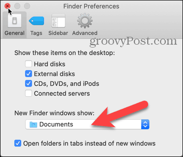 לחץ על חלונות התפריט הנפתח של New Finder בהעדפות Finder ב- Mac שלך